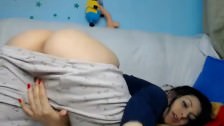 Cachonda en el dormitorio